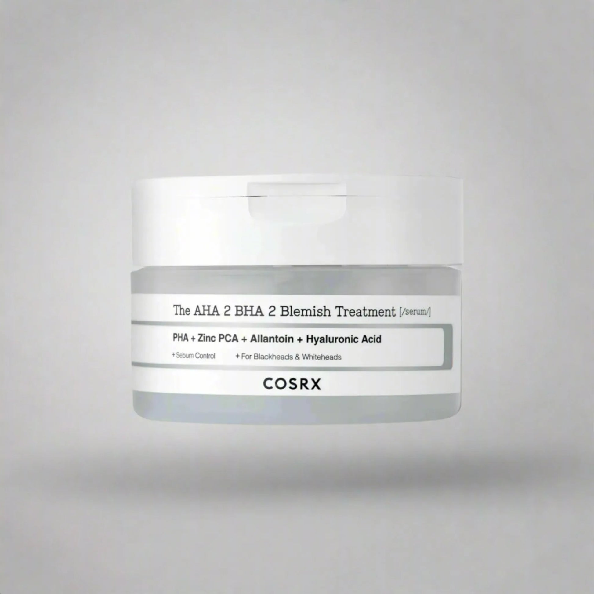 COSRX The AHA 2 BHA 2 Blemish Treatment Serum 50g, με τη συσκευασία να είναι ορατή, παρέχει εξισορρόπηση και απολέπιση για πιο καθαρή επιδερμίδα.