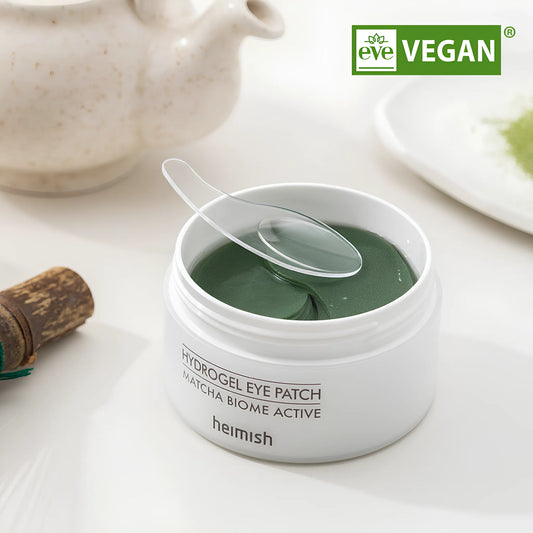 Heimish Matcha Biome Hydrogel Eye Patch (60ea), με τα επιθέματα να είναι ορατά, βοηθά στην ενυδάτωση και αποκατάσταση της φρεσκάδας γύρω από τα μάτια.