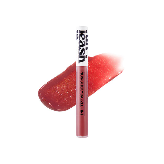 Unleashia Non Sticky Dazzle Tint Glossy Finish Tint - 2 Sunbeam 7.6g, με το lip tint να διακρίνεται, προσφέρει φωτεινότητα και λάμψη στα χείλη με γυαλιστερό φινίρισμα χωρίς κολλώδη αίσθηση.